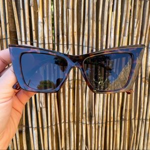 Cute, retro brown tortoise cat eye sunglasses. UV400 protection.